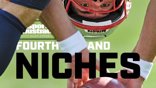 Patriots long snapper Joe Cardona looks back between his legs